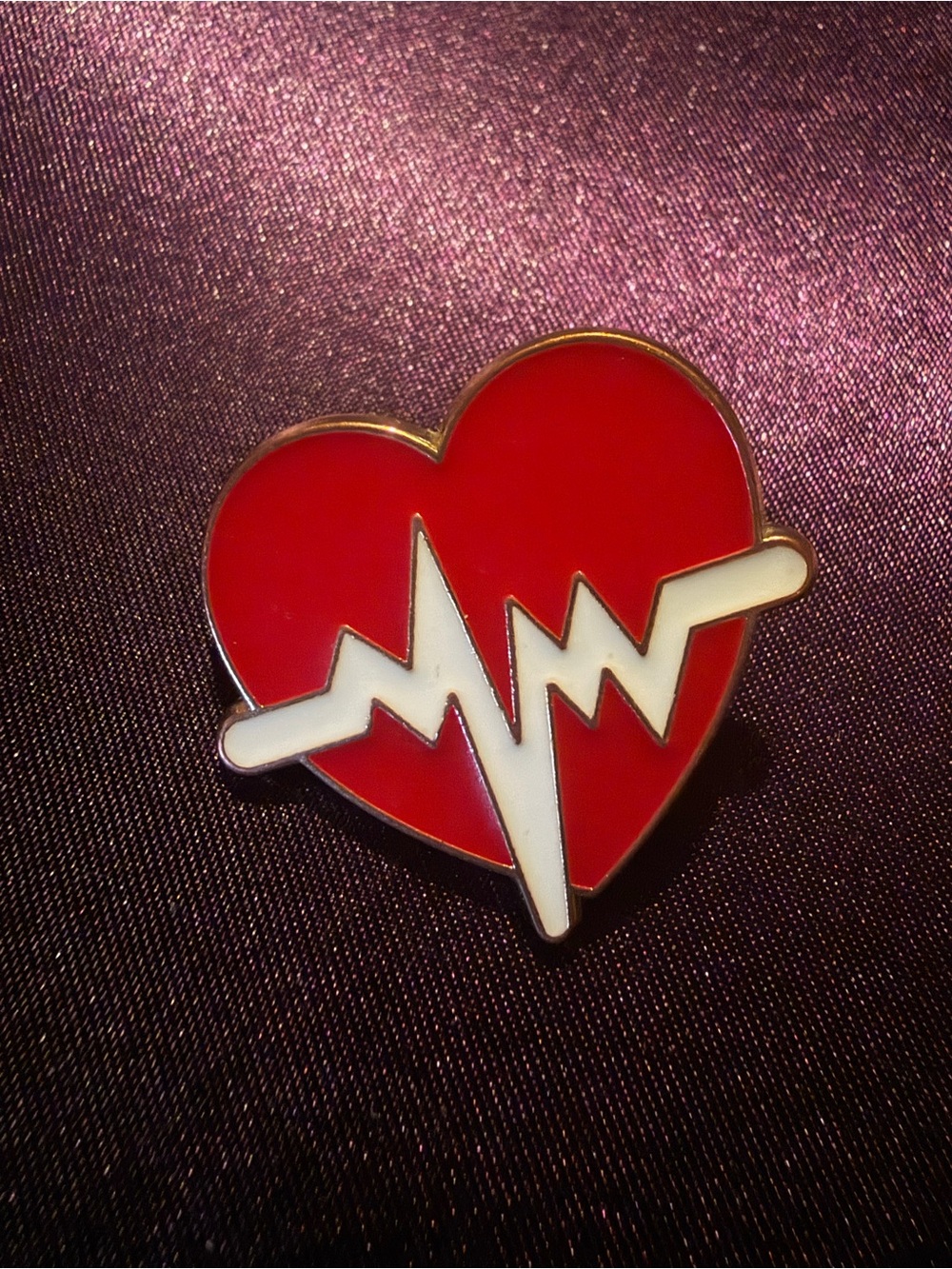 Red Heart Enamel Pin with White Heartbeat Design
